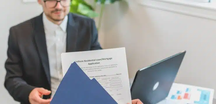 A Person Holding Loan Documents